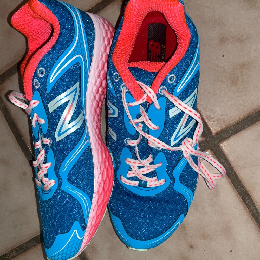 New Balance running shoes; worn a couple of times but look new! Size 7